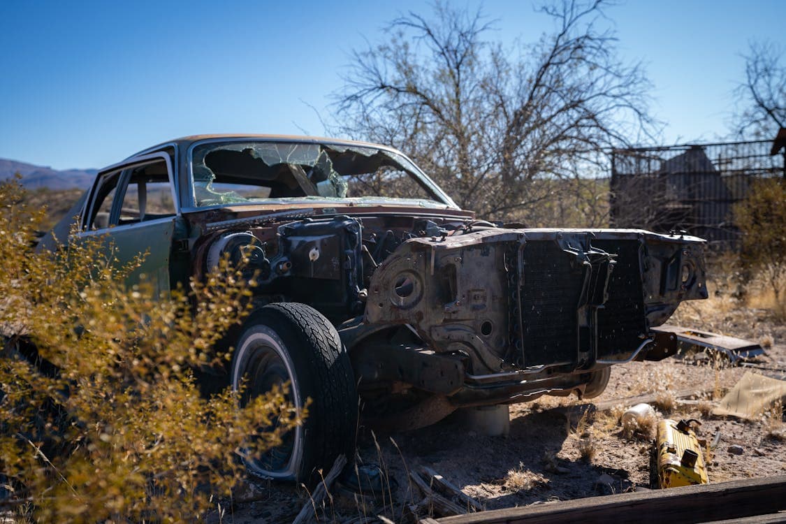 Damaged vehicles after a collision representing a hit-and-run accident scene