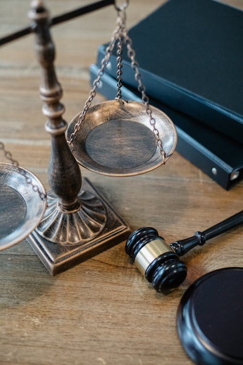 Scales of justice representing state-specific accident laws